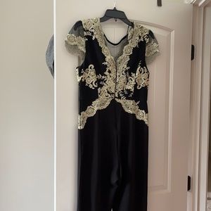 Black and gold jumpsuit size l